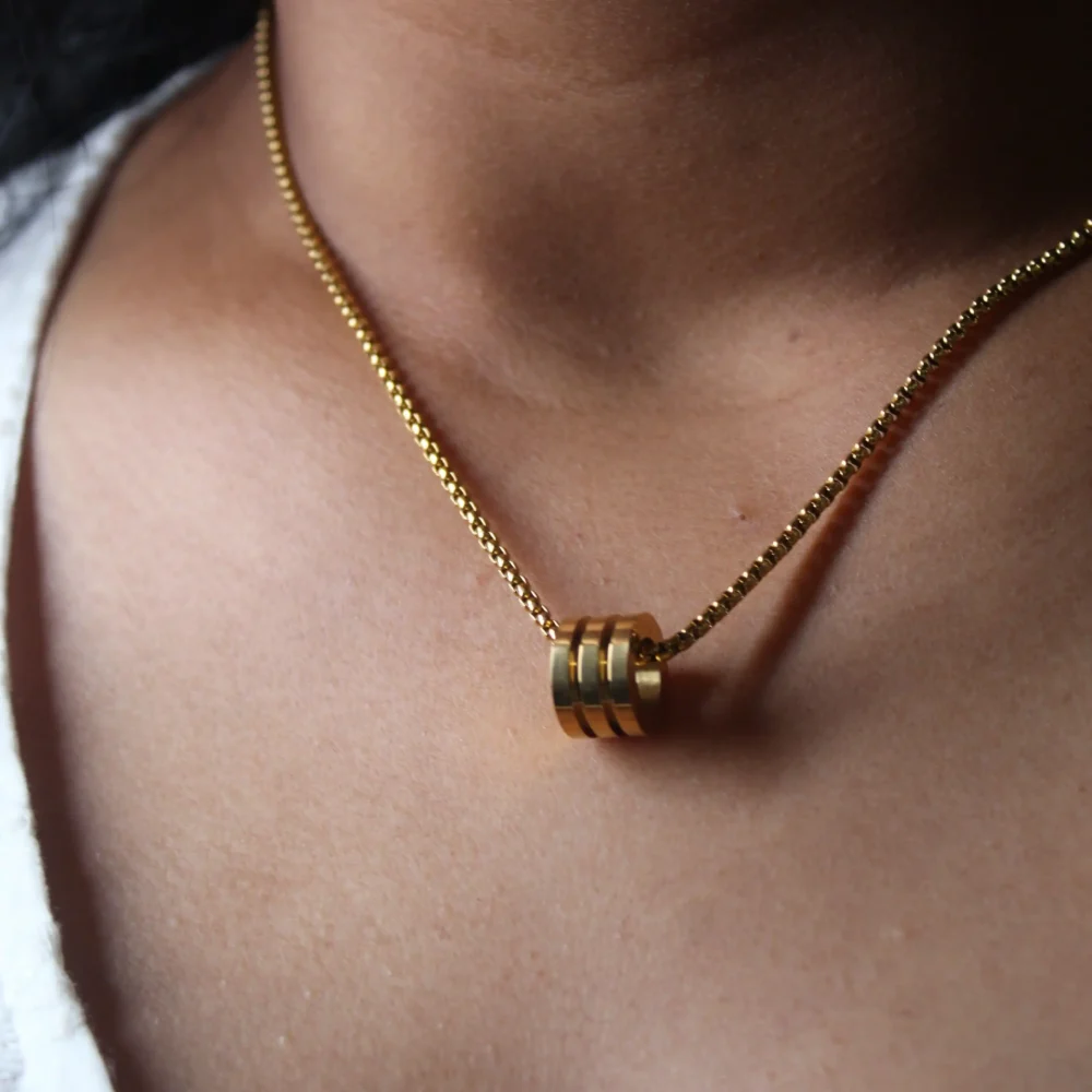 Gold Cylinder Pendant Necklace