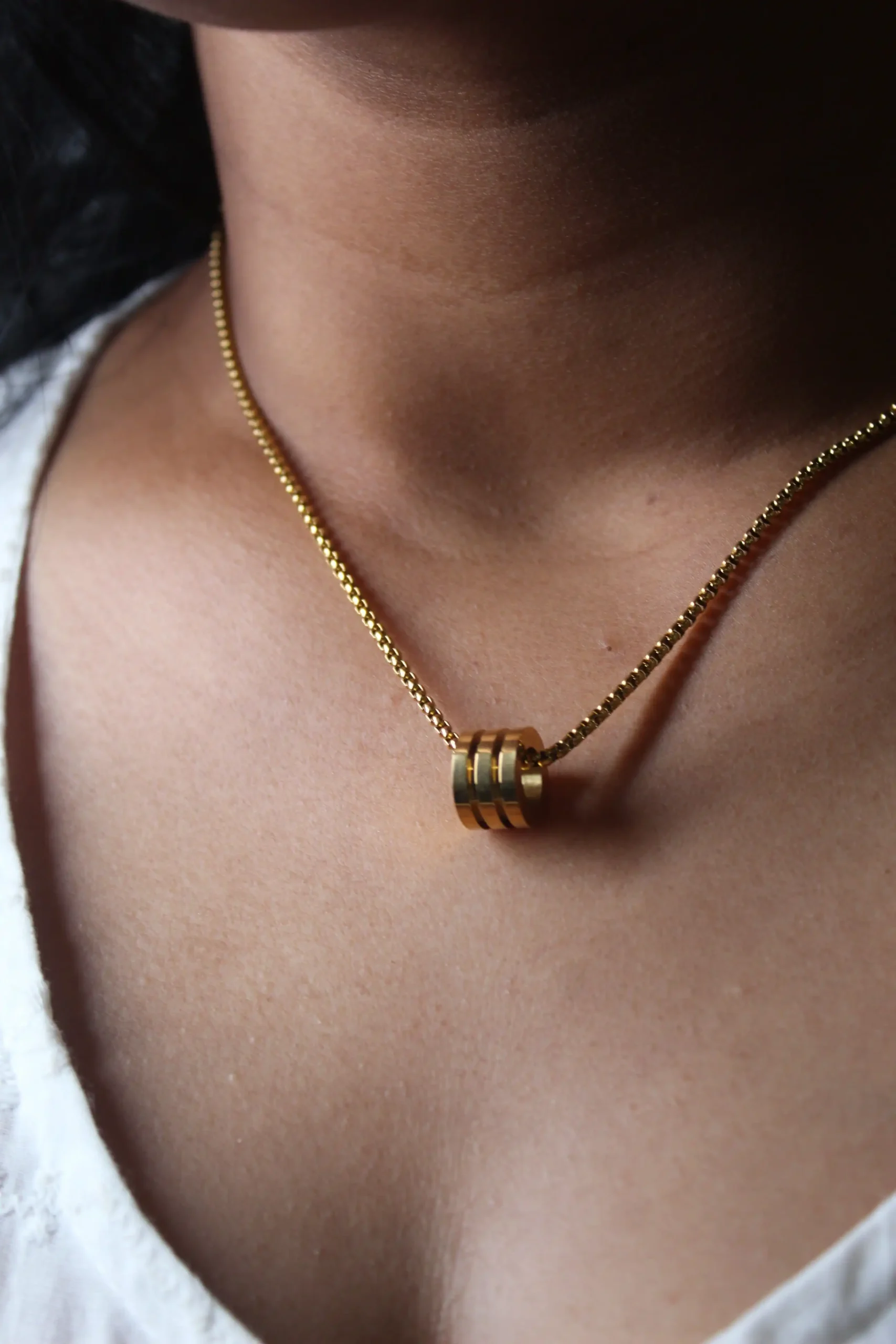 Gold Cylinder Pendant Necklace